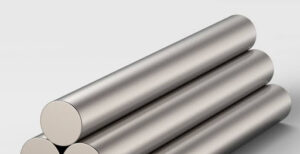 A round grey bar of metal placed atop similar bars
